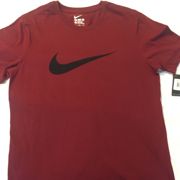 black nike shirt with red swoosh